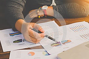 Businessman working on a desk numerical analysis, financial