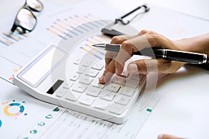 Businessman working on Desk office business financial accounting calculate, Graph analysis