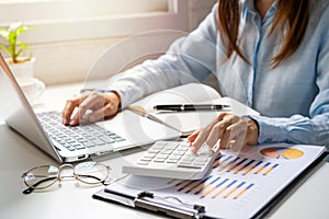 Businessman working on Desk office business financial accounting calculate, Graph analysis