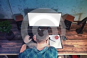 Businessman working at a desktop computer