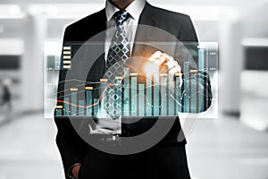 Businessman working with digital finance business graph of perceptive technology