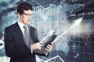 Businessman working with digital tablet on a financial chart with up arrows and world map background, double exposure