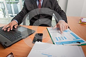 Businessman at working with financial reports