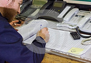 Businessman working on his project, young man working in his office