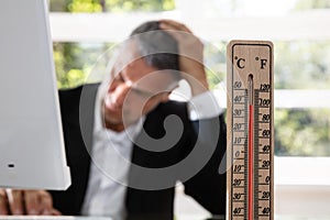 Businessman Working During Hot Weather