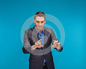 Businessman working with imaginary virtual screen