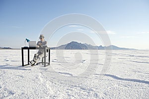 Businessman Working on Inspiration at Desk Outdoors