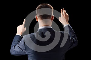 Businessman working with invisible virtual screen