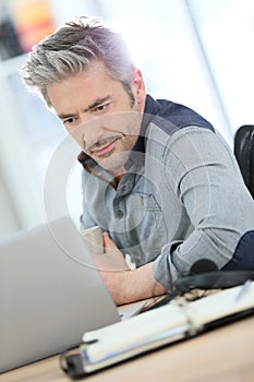 Businessman working on laptop