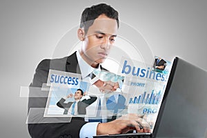 Businessman working on laptop. conceptual image