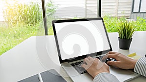 businessman working on laptop He was typing messages to colleagues and documenting financial information