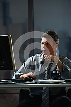 Businessman working late in office