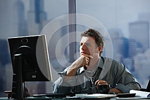 Businessman working late in office