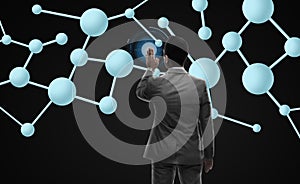 Businessman working with molecule formula