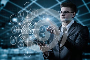 Businessman working with network computing cloud