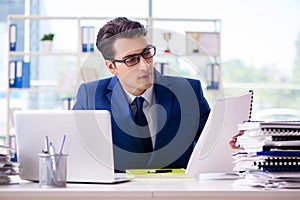 The businessman working in the office