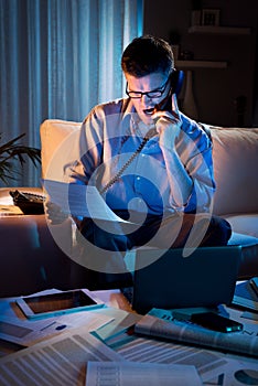 Businessman working overtime at home