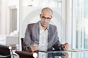 Businessman working on phone