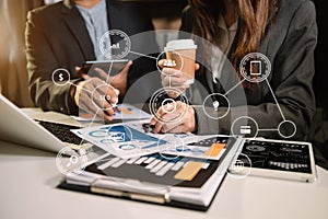 Businessman working with smart phone and laptop and digital tablet computer in  office with digital marketing media