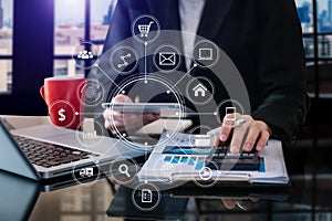 Businessman working with smart phone and laptop and digital tablet computer in  office with digital marketing media