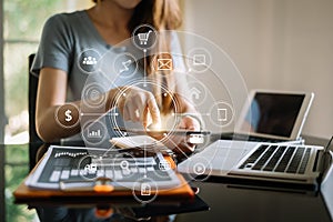 Businessman working with smart phone and laptop and digital tablet computer in  office with digital marketing media  in virtual