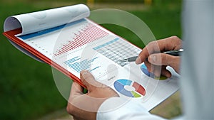 Businessman working with stock documents