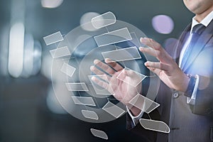 Businessman working on a virtual computer screen with program flowchart flowchart