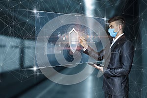 Businessman working on virtual computer screen with protection of financial funds in the bank