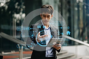 Businessman working virtual tablet computer twith reduce CO2 concept with icons, global warming such as reforest green factory