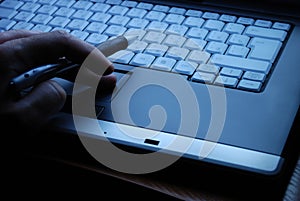 Businessman works on a laptop