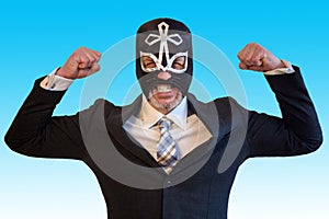 Businessman with wrestler mask and fighting position
