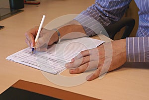 Businessman writing contract