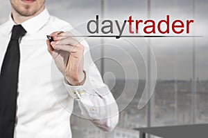 Businessman writing daytrader in the air