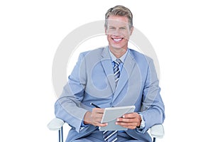 Businessman writing down on a notebook