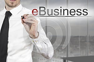 Businessman writing ebusiness