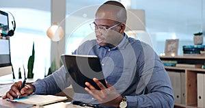 Businessman, writing and notes on tablet, planning and working on proposal, report and project. Black person, internet