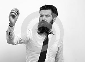 Businessman writing. Teacher standing in front of the blank class blackboard with pen ready to commence writing.