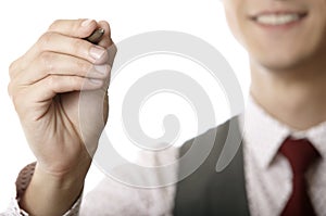 Businessman writing on a virtual whiteboard