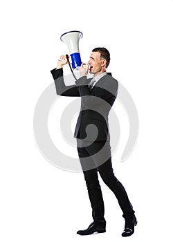 Businessman yelling through megaphone