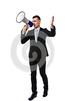 Businessman yelling through megaphone