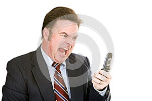 Businessman Yelling into Phone photo