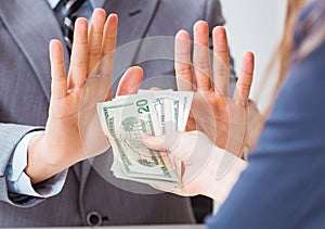 Businessmanbeing offered bribe for breaking law
