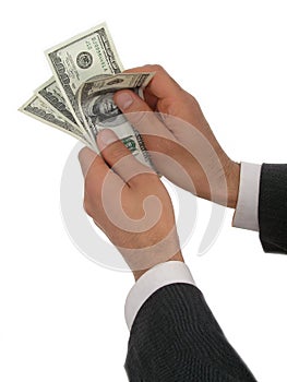 Businessmanâ€™s Hands Counting Money