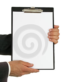 Businessmanâ€™s Hands Holding Clipboard