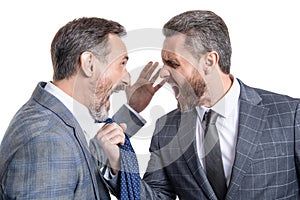 businessmen arguing in studio. arguing businessmen shouting. photo of businessmen arguing