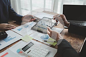 Businessmen are attending a meeting about finances, Discussing tax payments in the conference room, Meeting to plan marketing to