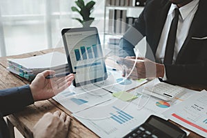 Businessmen are attending a meeting about finances, Discussing tax payments in the conference room, Meeting to plan marketing to