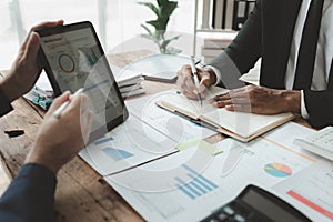 Businessmen are attending a meeting about finances, Discussing tax payments in the conference room, Meeting to plan marketing to