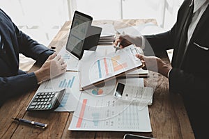 Businessmen are attending a meeting about finances, Discussing tax payments in the conference room, Meeting to plan marketing to