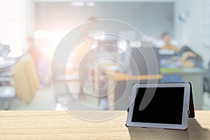 Businessmen blur in the workplace or work space of laptop on table in office room with computer or shallow depth of focus of